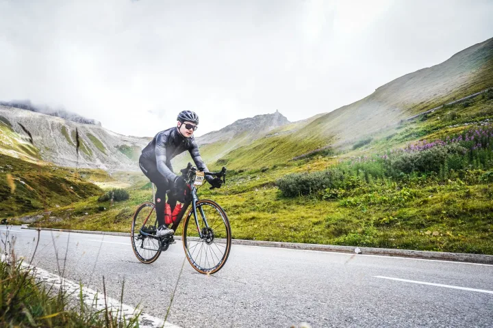 Dominik on a road bike in the Swiss Alps